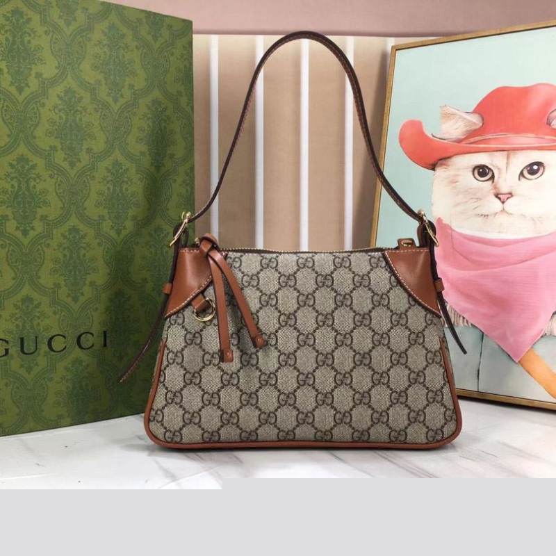 G*u*i top handle bags
